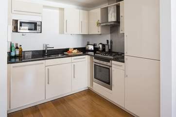 Compact yet well-equipped kitchen.
