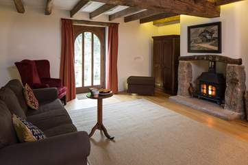 Retiring to the sitting-room and cosying up in front of the glowing wood-burner after a full day of activity sounds bliss.
