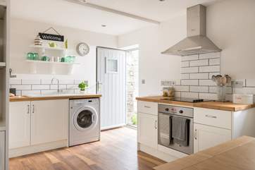 The kitchen door opens to the courtyard.