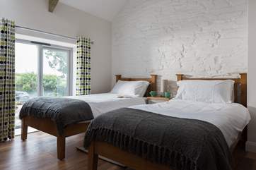 Bedroom 2 has twin beds.