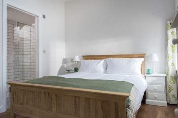 Bedroom 1 has an en suite shower-room with a big shower cubicle.