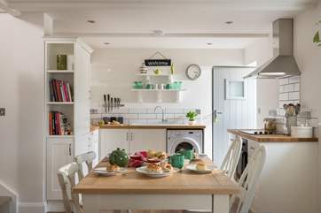 The cottage is decorated in lovely light colours.