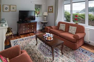 Imagine enjoying a cream tea in this beautiful sitting-room, with such a wonderful view.