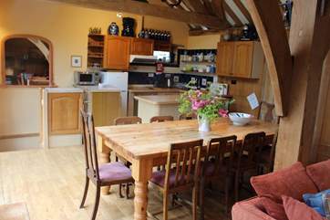 What a welcoming open plan kitchen and dining-area. Perfect for whipping up a feast.