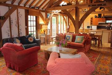 Bright and welcoming sitting area. A game or two of charades to finish a charming day/night is just the ticket in this lovely open plan living-area.
