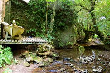 What a romantic spot to sit back with a glass of something refreshing and listen to the stream babble by.