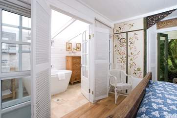 Fill the free-standing tub with bubbles, sink in and relax - heaven!