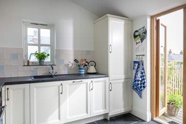 The door from the kitchen leads directly onto the patio.