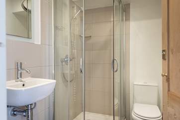 The shower-room with large corner cubicle.