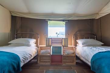 Complete with quirky storage/bedside tables.
