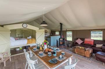 A wonderful family retreat with three separate bedroom areas, one is the great fun enclosed cabin seen here, then there is a double and a twin bedroom towards the back of the tent.