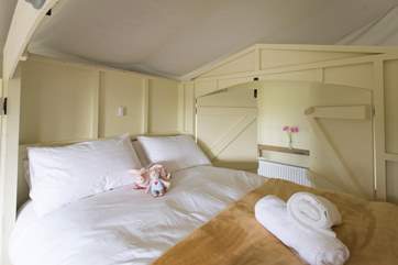 The king-size cabin bed is super cute and cosy.
