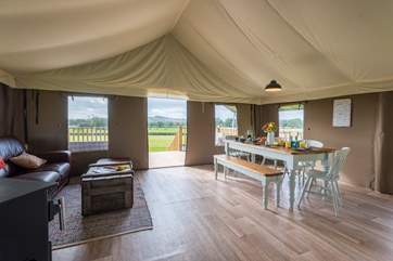 There is plenty of space for all around the lovely dining-table.