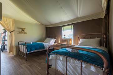 The twin room can be screened from the living area with the handy curtain.