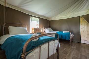 The twin room has lovely copper bed frames.