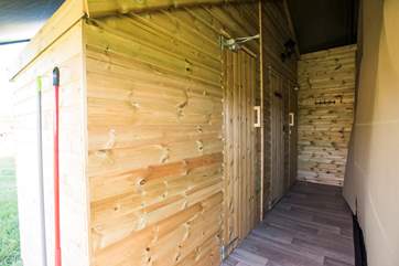 This is the corridor to the shower-room and cloakroom, accessed from inside or outside the tent.