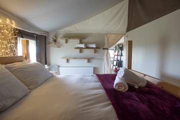 A thick sprung mattress ensures a restful night.