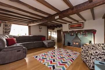 This is the main living-room with its wonderful wood-burning stove.