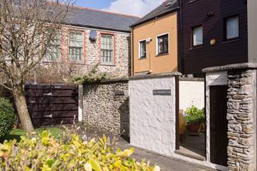 High walls give the rear courtyard ample privacy.