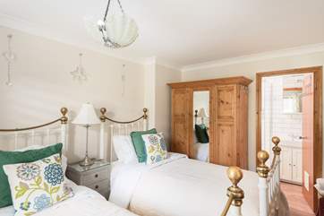 The twin bedroom has an en suite shower-room.