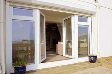 Open up the patio doors and let th summer air come through
