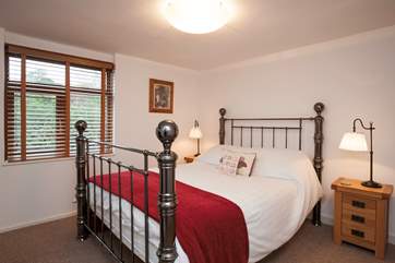 The second bedroom offers a lovely and comfortable room to relax in