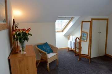Please note, there is some head height restrictions due to the sloping roof