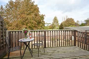 Take a drink and magazine outside and relax in the summer sunshine