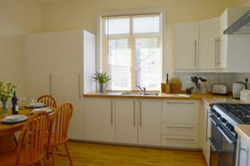 Contemporary-style kitchen with dining-area.