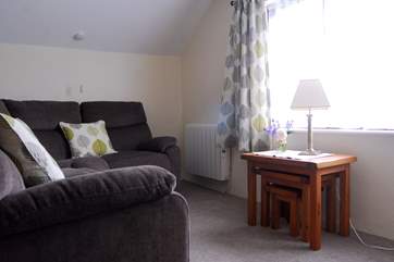 Sitting-room 2 has a big, comfortable corner sofa, perfect for sitting back and watching a film.