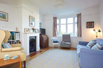 The main sitting-room is very comfortable, perfect for relaxing and snuggling on the sofa