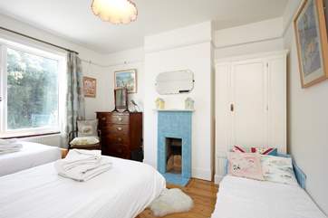 In the twin bedroom is a cute little todler bed for the little ones