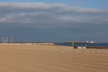 Just a minutes walk away is this stunning, golden sandy beach