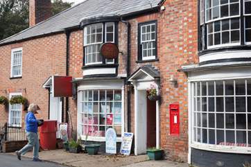 There is a small shop in the village, just around the corner.