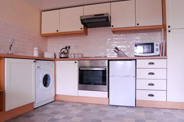 The kitchen area is very well-equipped.