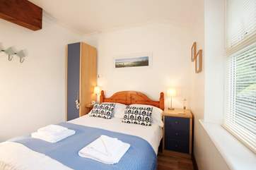 The double bedroom with comfortable bed for a good night's sleep.