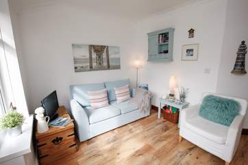 Snuggle up together in front of the TV with your feet up and a glass of something cheeky