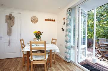 The dining-room with french doors out to the patio