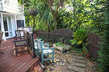 A private courtyard style rear garden to relax in the shade
