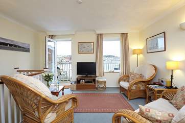 From the comfort of your chair, look up from your book to see the River Medina and beyond to the sailing town of Cowes