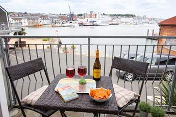 Enjoy watching the busy boat traffic from your private balcony.