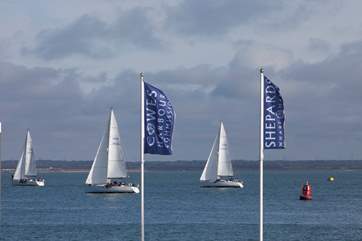 Sit on the seafront and watch the boats sail by.