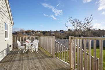 Relax on the decking within the calm and tranquill setting