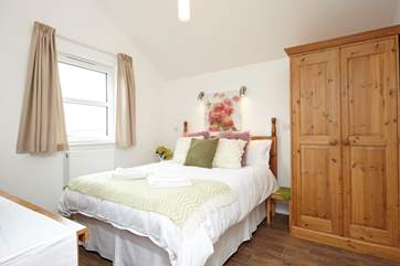 Tuck up in the comfy double bed after a day exploring the Island