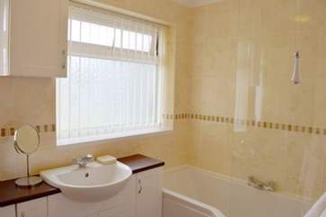 The family bathroom with fitted shower