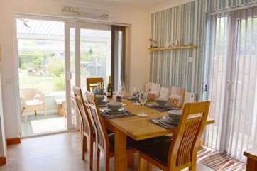 The dining area has ample room for the whole family to gather around the table for a yummy family meal