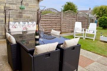 Enjoy dining al fresco in the sunny garden.