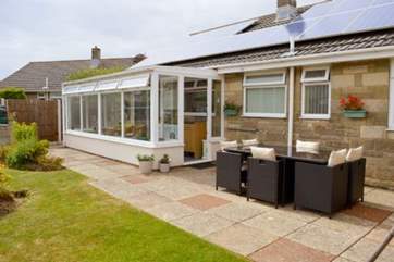 The enclosed rear garden.