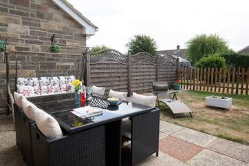 There is ample seating in the garden, making it the perfect spot for al fresco dining.