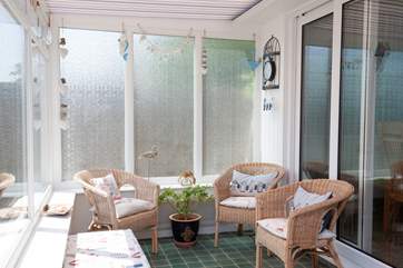 The conservatory is a lovely addition to this already spacious property.